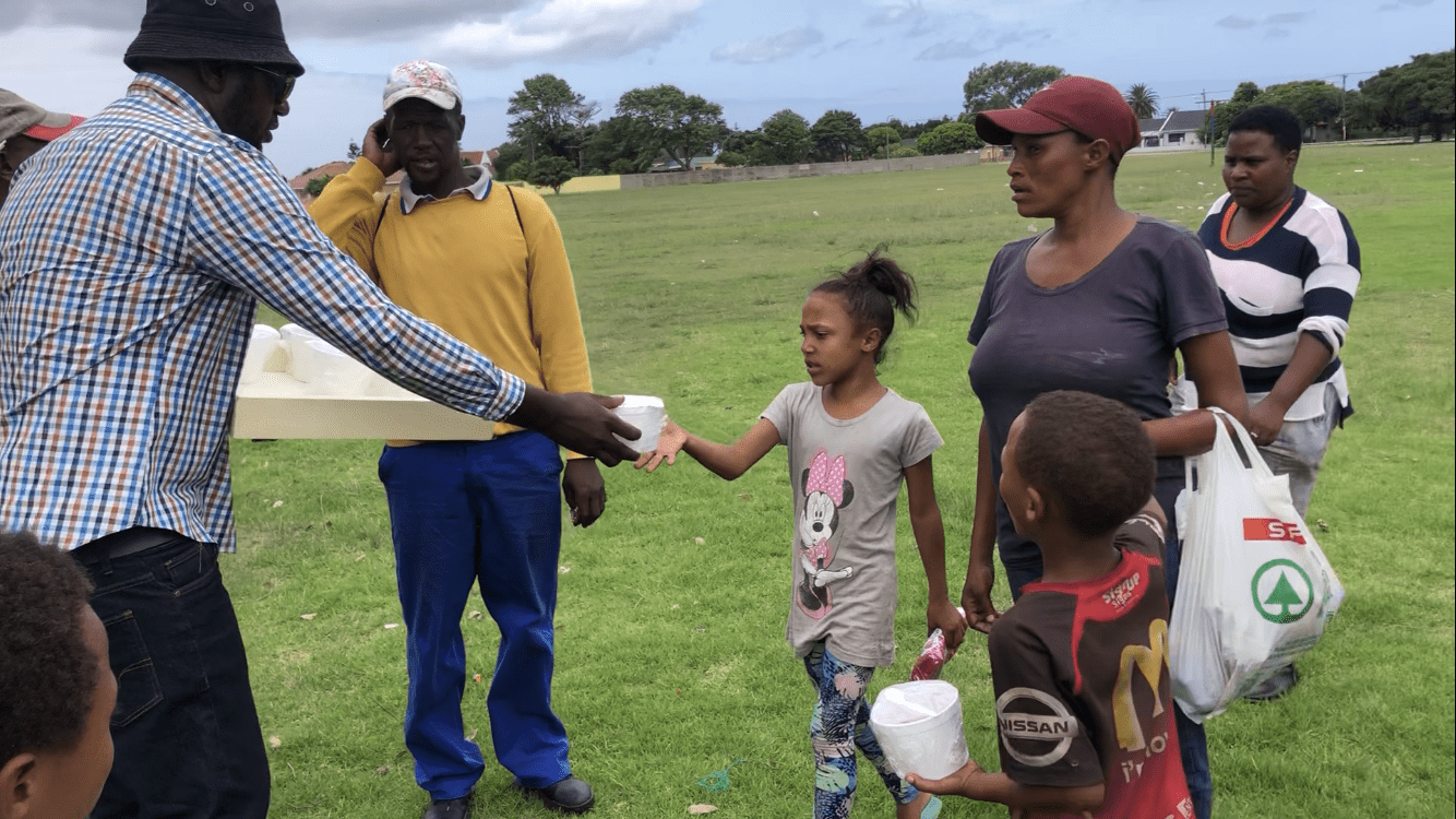 Feeding soup to children